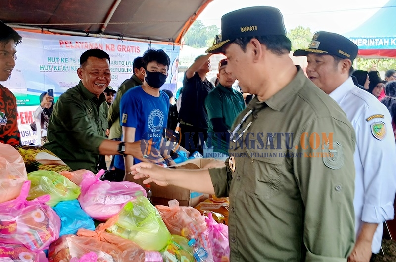 Bupati Shalahuddin Tebar Benih Ikan di DAM Trinsing, Ajak Masyarakat Jaga Kelestarian Perairan